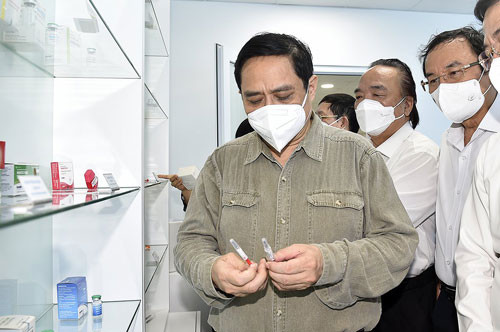 Thủ tướng Phạm Minh Chính: Sản xuất bằng được vaccine, thuốc điều trị Covid-19 Thu tuong Pham Minh Chinh: San xuat bang duoc vaccine, thuoc dieu tri Covid-19