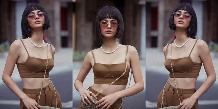 Emma Lê khéo léo khoe eo thon, ngực đầy với set đồ cá tính. Ảnh:FBNV.