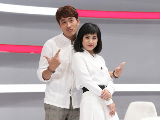 Nhờ cách ăn vận và trang điểm, cô trông khá xứng với Kiều Minh Tuấn.