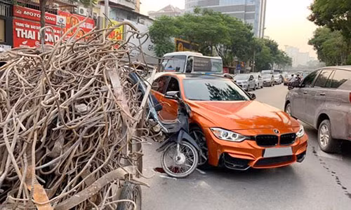 Ha Noi: Sedan BMW 3-Series tien ty bi xe ba gac 