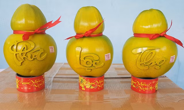 Những loại trái cây được tạo hình độc đáo đắt hàng dịp Tết - Hình 8 Nhung loai trai cay duoc tao hinh doc dao dat hang dip Tet-Hinh-8