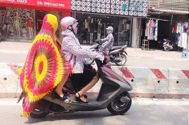 Hết hồn với "style Ninja" trong ngày nắng nóng đỉnh điểm ở Sài Gòn - Hình 2 Het hon voi