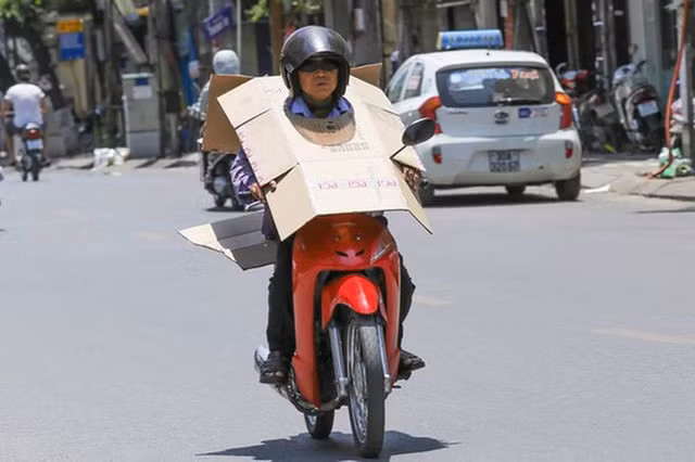 Hết hồn với "style Ninja" trong ngày nắng nóng đỉnh điểm ở Sài Gòn - Hình 7 Het hon voi