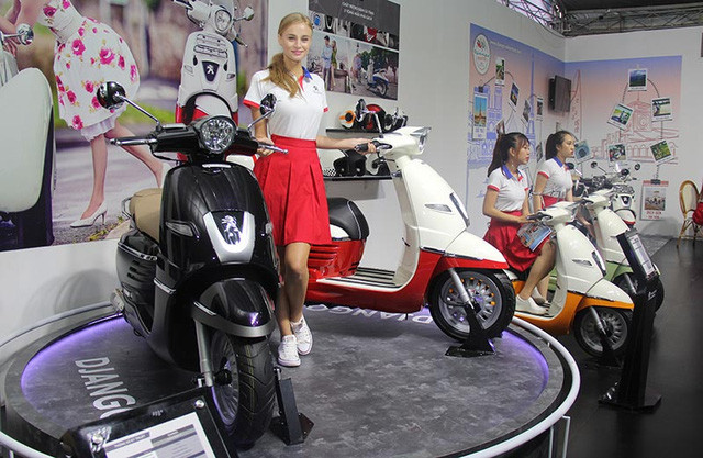 Xe máy vẫn là phương tiện giao thông chủ yếu của người Việt - Hình 2 Xe may van la phuong tien giao thong chu yeu cua nguoi Viet-Hinh-2