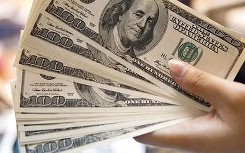 Tỷ giá VND/USD ít chịu tác động bởi quyết định nâng lãi suất của FED lần này. Ảnh minh họa: KT.