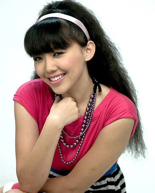 Tóc Tiên nổi tiếng từ bé với mái tóc xù. Tóc Tiên nổi tiếng từ bé với mái tóc xù.