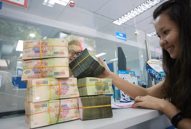 Thưởng Tết 2018 tại Đồng Nai cao nhất là 408 triệu đồng, còn tại TP HCM là 1,5 tỷ đồng. Ảnh: Tiền Phong.