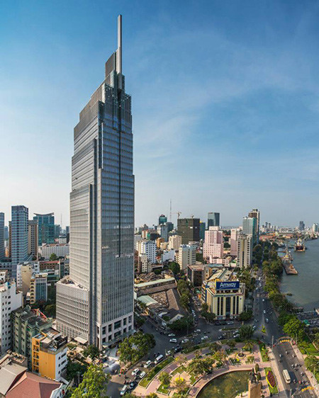 Theo đó, cao ốc Vietcombank Tower được xây dựng trên diện tích khoảng 3.200 m2, cao 206 m gồm: 35 tầng cao, 4 tầng hầm, khối đế và khối tháp hình chữ nhật hướng tâm. Ảnh: Vietnamnet. Theo đó, cao ốc Vietcombank Tower được xây dựng trên diện tích khoảng 3.200 m2, cao 206 m gồm: 35 tầng cao, 4 tầng hầm, khối đế và khối tháp hình chữ nhật hướng tâm. Ảnh: Vietnamnet.