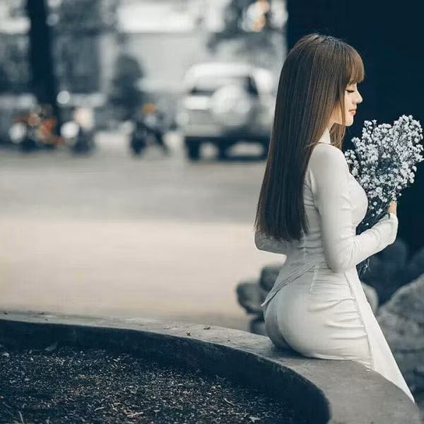 Dịu dàng và quyến rũ chẳng thua kém ai là điều mà các gymer diện áo dài muốn chứng minh.