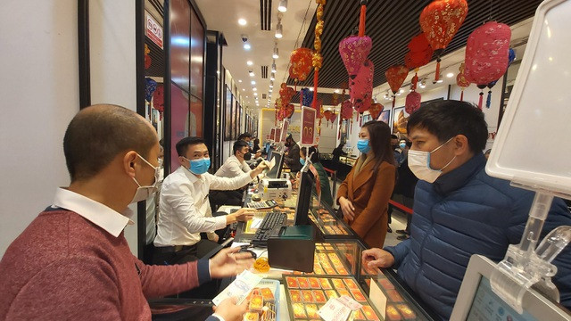 Tiền lì xì nên mua gì để được may mắn cả năm? - Hình 5 Tien li xi nen mua gi de duoc may man ca nam?-Hinh-5