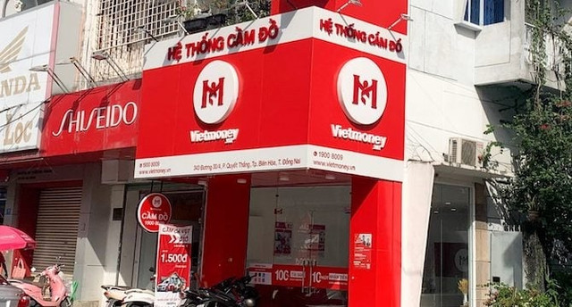 Dang sau ly do Digiworld rut khoi chuoi cam do Vietmoney