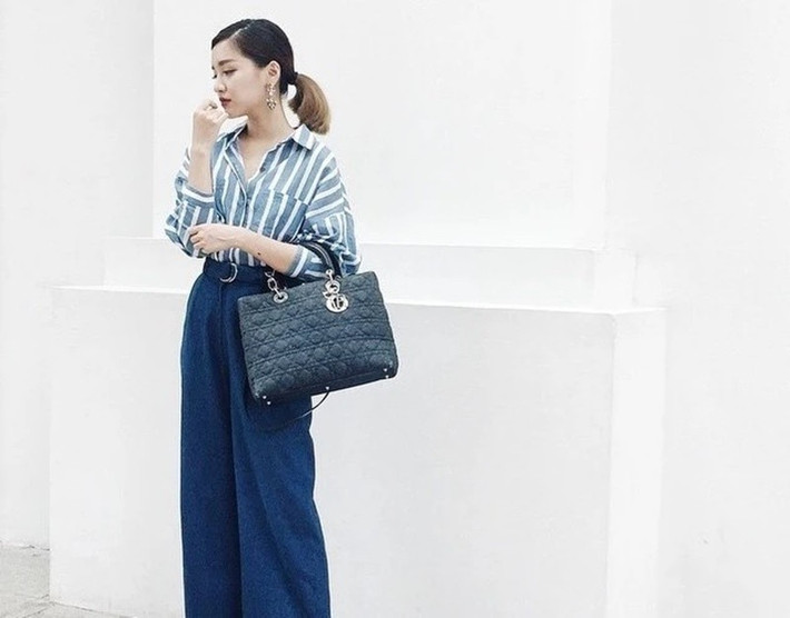 Nữ ca sĩ dùng mẫu túi Large Lady Dior Lambskin gần 4.000 USD (khoảng 100 triệu đồng). Ảnh: FB Bích Phương.