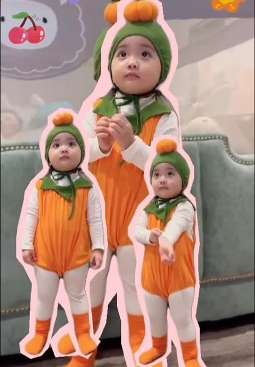 "Lisa bánh bao hoá thân thành quả bí Halloween", Khánh Thi chia sẻ. Ảnh: Instagram Khánh Thi Phan Hiển.