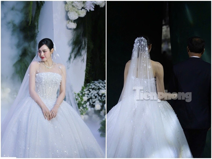 Đỗ Thị Hà đẹp như nàng công chúa trong đám cưới khi diện chiếc váy trắng đính kết pha lê tinh xảo. Ảnh: Tiền Phong.