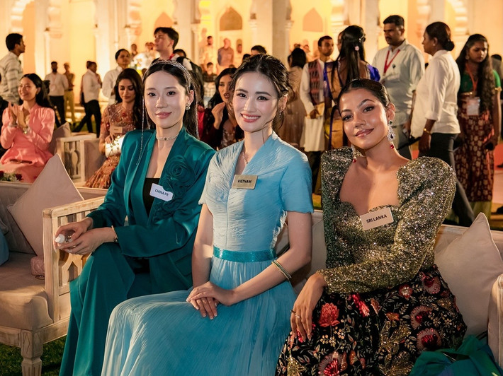 Fanpage Miss World đăng tải hình ảnh Ý Nhi diện váy xanh trong một hoạt động. Ảnh: Miss World.