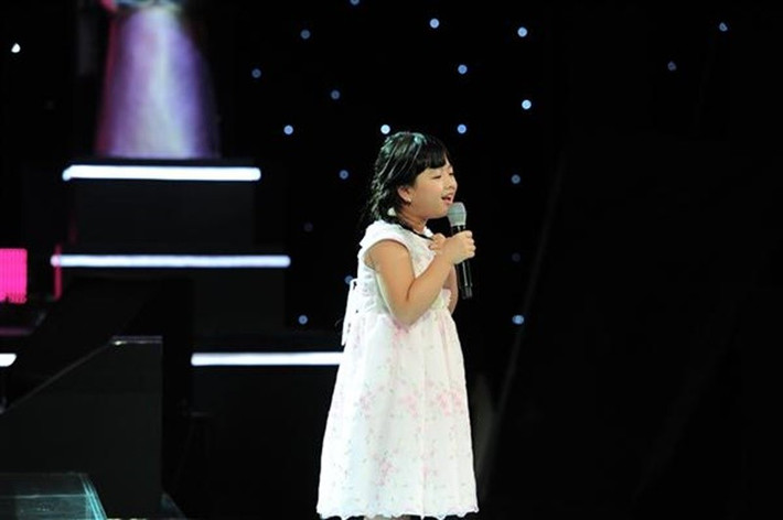 Hồng Khanh từng tham gia Giọng hát Việt nhí 2013. Con gái Chiều Xuân không tiến sâu ở sân chơi âm nhạc này. Ảnh: Thể Thao Văn Hóa.