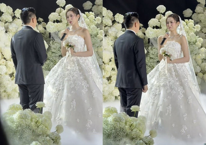 Trong đám cưới, Đỗ Thị Hà kể về tình yêu của mình. "Anh thích ăn cá khô, anh thích ăn thịt rang và em cũng thế. Để rồi hai đứa cùng nhau lên cân rồi lại cùng tập đến tận 11h đêm để giảm cân trước ngày cưới", Vietnamnet dẫn lời nàng hậu. Ảnh: Người Đưa Tin.