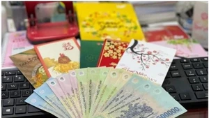 Nhận tiền thưởng Tết, có phải nộp thuế thu nhập cá nhân?