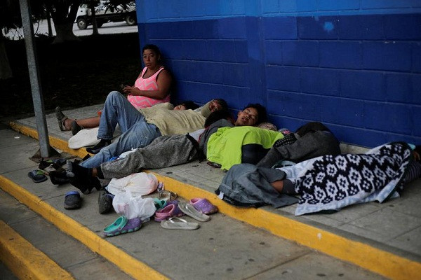 Hàng nghìn người di cư vạ vật tới Mỹ giữa “bão” COVID-19 - Hình 3 Hang nghin nguoi di cu va vat toi My giua “bao” COVID-19-Hinh-3