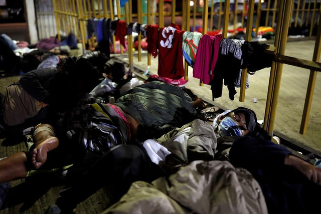 Hàng nghìn người di cư vạ vật tới Mỹ giữa “bão” COVID-19 - Hình 14 Hang nghin nguoi di cu va vat toi My giua “bao” COVID-19-Hinh-14