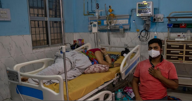 Hiện thực khắc nghiệt ở bệnh viện chữa COVID-19 tại Ấn Độ - Hình 13 Hien thuc khac nghiet o benh vien chua COVID-19 tai An Do-Hinh-13
