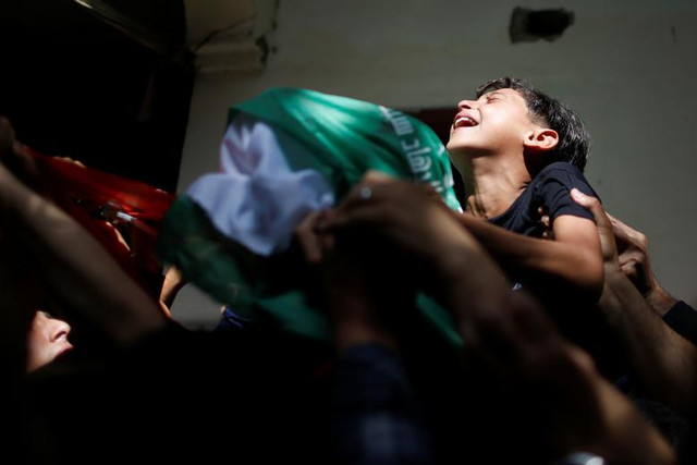 Cận cảnh Dải Gaza tan hoang sau đòn không kích của Israel - Hình 3 Can canh Dai Gaza tan hoang sau don khong kich cua Israel-Hinh-3