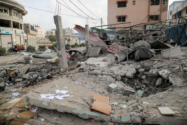 Cận cảnh Dải Gaza tan hoang sau đòn không kích của Israel - Hình 10 Can canh Dai Gaza tan hoang sau don khong kich cua Israel-Hinh-10