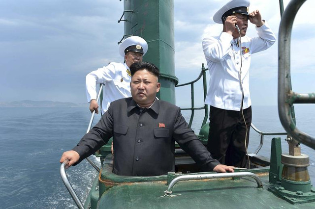 Chùm ảnh về các hoạt động của Chủ tịch Triều Tiên Kim Jong-un - Hình 3 Chum anh ve cac hoat dong cua Chu tich Trieu Tien Kim Jong-un-Hinh-3