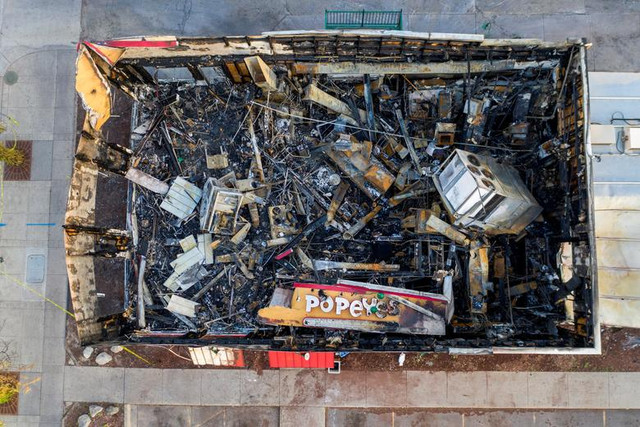 Sau bieu tinh, thanh pho Minneapolis nhu 'vung chien su'-Hinh-9