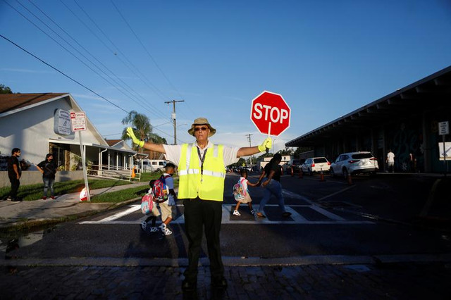 Loat anh hoc sinh nuoc My tro lai truong bat chap COVID-19