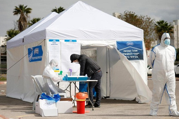 Cử tri Israel bị cách ly vì Covid-19 vẫn đi bỏ phiếu bầu Quốc hội - Hình 4 Cu tri Israel bi cach ly vi Covid-19 van di bo phieu bau Quoc hoi-Hinh-4