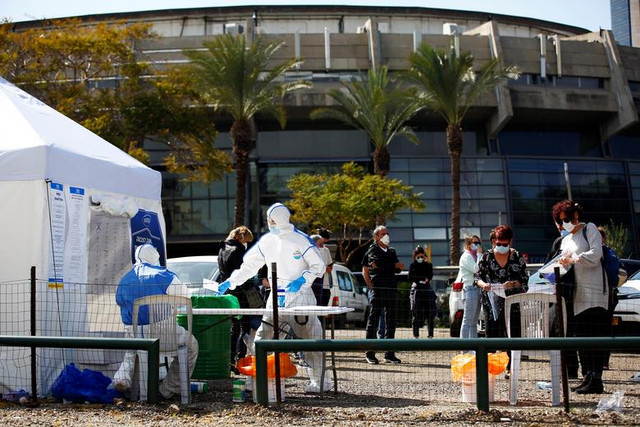 Cử tri Israel bị cách ly vì Covid-19 vẫn đi bỏ phiếu bầu Quốc hội - Hình 10 Cu tri Israel bi cach ly vi Covid-19 van di bo phieu bau Quoc hoi-Hinh-10