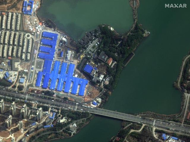 Loạt ảnh lột tả sự tàn phá khi dịch Covid-19 bùng phát - Hình 6 Loat anh lot ta su tan pha khi dich Covid-19 bung phat-Hinh-6