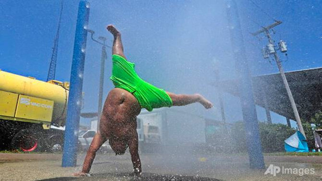 Nguoi dan My giai nhiet nhu nao giua nang nong ky luc?-Hinh-12