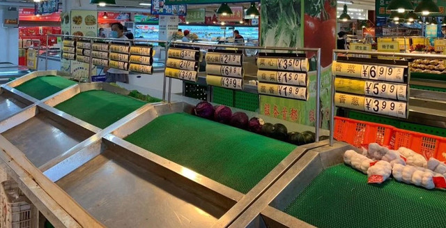 Ảnh hiếm chợ đầu mối là ổ dịch COVID-19 ở Bắc Kinh - Hình 10 Anh hiem cho dau moi la o dich COVID-19 o Bac Kinh-Hinh-10