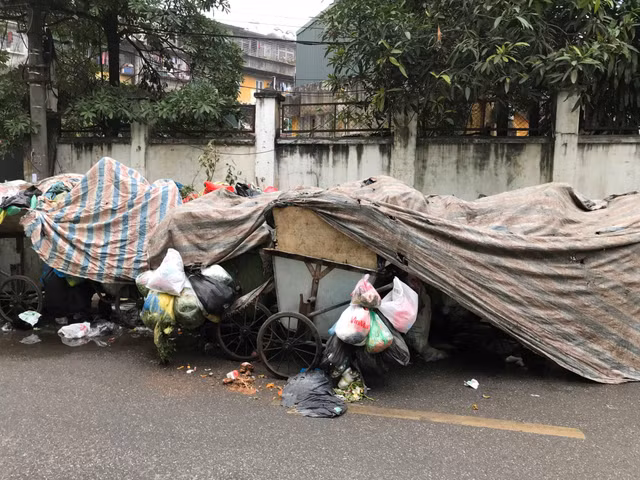 Hà Nội ra sao sau khi bãi rác Nam Sơn hoạt động trở lại? - Hình 10 Ha Noi ra sao sau khi bai rac Nam Son hoat dong tro lai?-Hinh-10