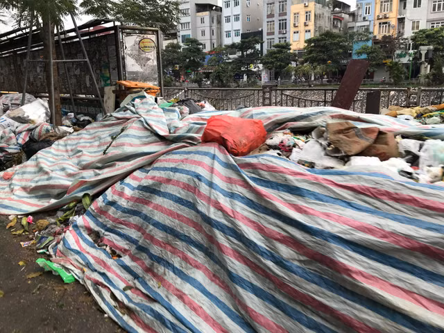 Hà Nội ra sao sau khi bãi rác Nam Sơn hoạt động trở lại? - Hình 9 Ha Noi ra sao sau khi bai rac Nam Son hoat dong tro lai?-Hinh-9