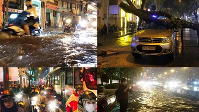 TP.HCM: Mưa lớn khủng khiếp, đường phố nước cuồn cuộn như sông