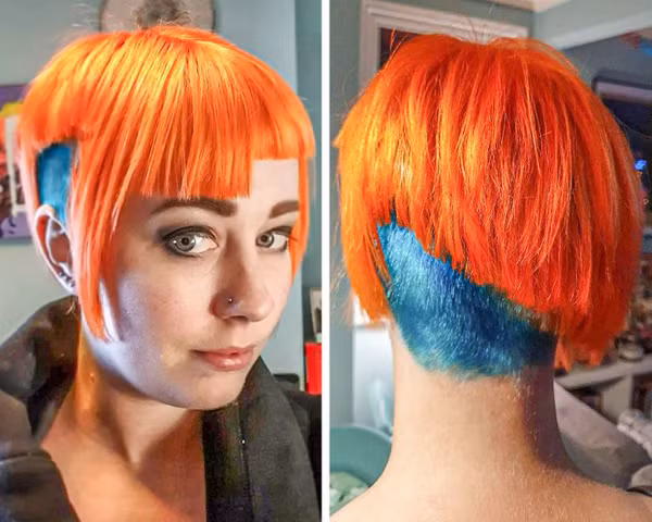 Theo đuổi phong cách cyberpunk, chủ nhân mái tóc trở nên vô cùng nổi bật với màu tóc sặc sỡ, cắt thành từng tầng một cách khó hiểu.