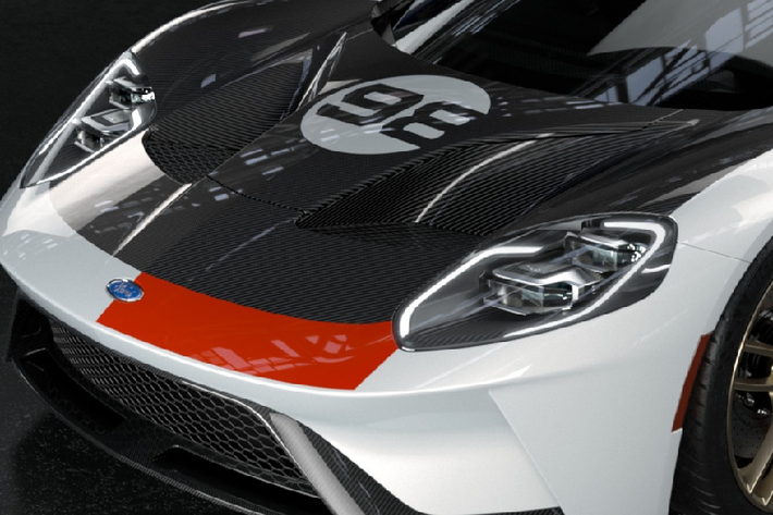 Ford GT Heritage Edition mới có ngoại thất lấy cảm hứng từ phong cách cổ điển với màu sơn trắng Frozen White cùng các điểm nhấn màu đỏ Race Red. Những điểm nổi bật khác bao gồm nắp ca-pô bằng sợi carbon cùng số 98