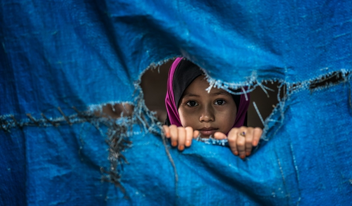 Bé gái người dân tộc ở Tây Ninh sinh sống ở Sài Gòn. 