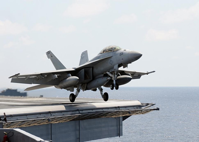 fighter-jet-taking-off-from-aircraft-carrier.jpg
