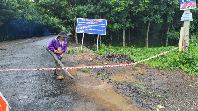 Duong Song Nhan - Dau Giay (Dong Nai): Troi mua nha thau van tham nhua? (bai 1)-Hinh-5