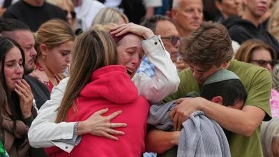 Hình ảnh người dân ở Australia tưởng niệm nạn nhân vụ xả súng