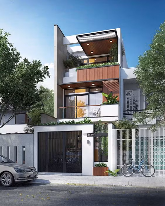 Nhà 3 tầng mang hơi thở hiện đại nhưng vô cùng gần gũi với thiết kế cây xanh và vật liệu gỗ quen thuộc. Ảnh: Xaynhapho.