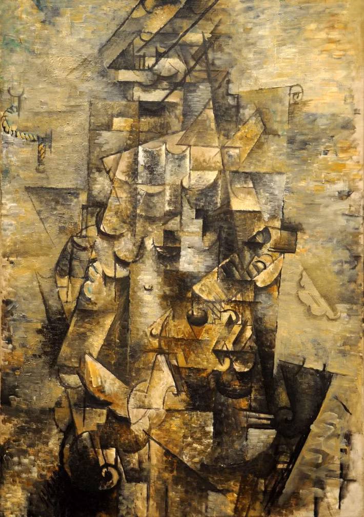  5. Man with a Guitar (1911) – Georges Braque. Braque đã đưa lập thể đến cực điểm với bức tranh này, sử dụng các mảng màu sắc và hình học để làm cho người xem phải tập trung vào cấu trúc tổng thể của hình ảnh, thay vì nhận diện ngay lập tức đối tượng. Ảnh: Pinterest.