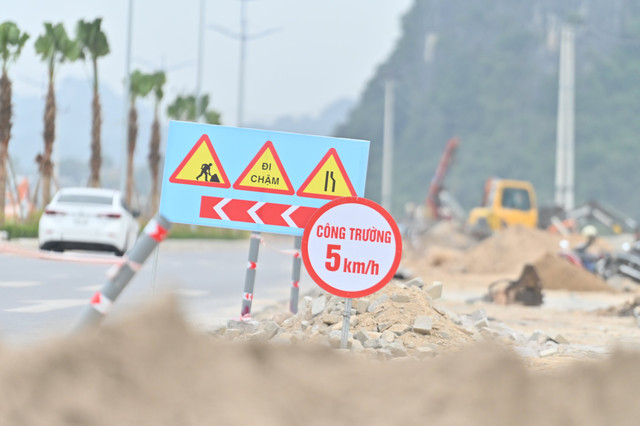 Tuyến đường nối Hạ Long và Cẩm Phả có xong trước Tết Nguyên đán? - Hình 4 Tuyen duong noi Ha Long va Cam Pha co xong truoc Tet Nguyen dan?-Hinh-4
