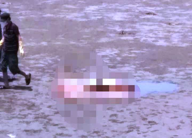 Kinh hãi phát hiện xác chết không đầu trên bờ biển Kinh hai phat hien xac chet khong dau tren bo bien