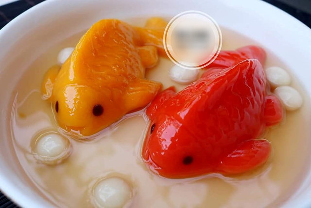 Biết gì về loại bánh Tổ cá chép được nhiều người Việt mua cúng ông Táo? - Hình 6 Biet gi ve loai banh To ca chep duoc nhieu nguoi Viet mua cung ong Tao?-Hinh-6