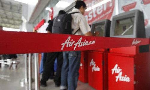 Cổ phiếu Air Asia rớt thảm sau máy bay QZ8501 mất tích hình ảnh Co phieu Air Asia rot tham sau may bay QZ8501 mat tich hinh anh